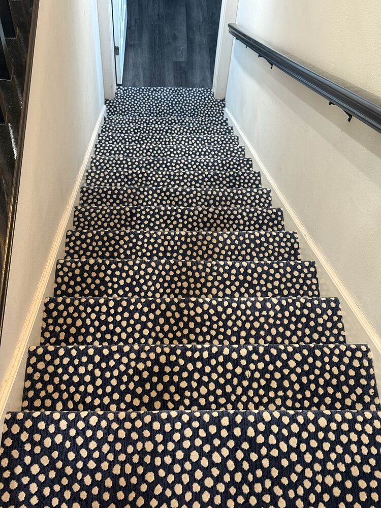 Patterned carpet installed on a staircase
