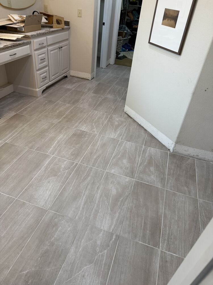 Gray tile flooring in a bathroom